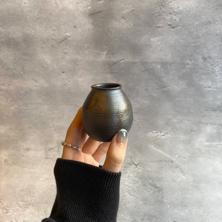 Seaweed-wrapped vase
