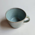 Mug with plenty of pine ash glaze