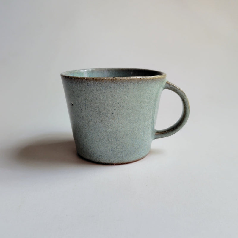 Mug with plenty of pine ash glaze