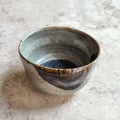 Oni-unofu-glazed indented tea bowl