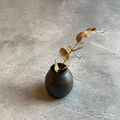 Seaweed-wrapped vase