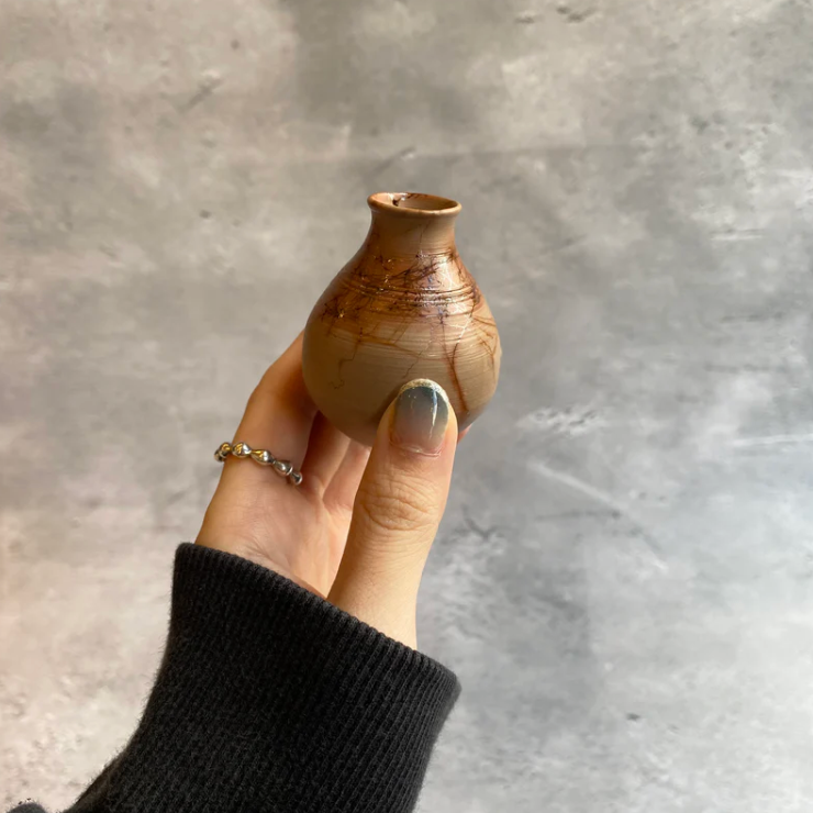 Algae-covered vase